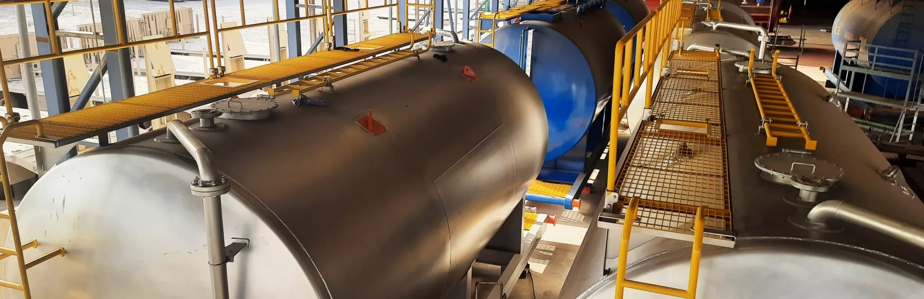 Horizontal steel storage tank for industrial liquid containment, manufactured in UAE by Diamond Steel Industries for oil, water, and chemical storage applications